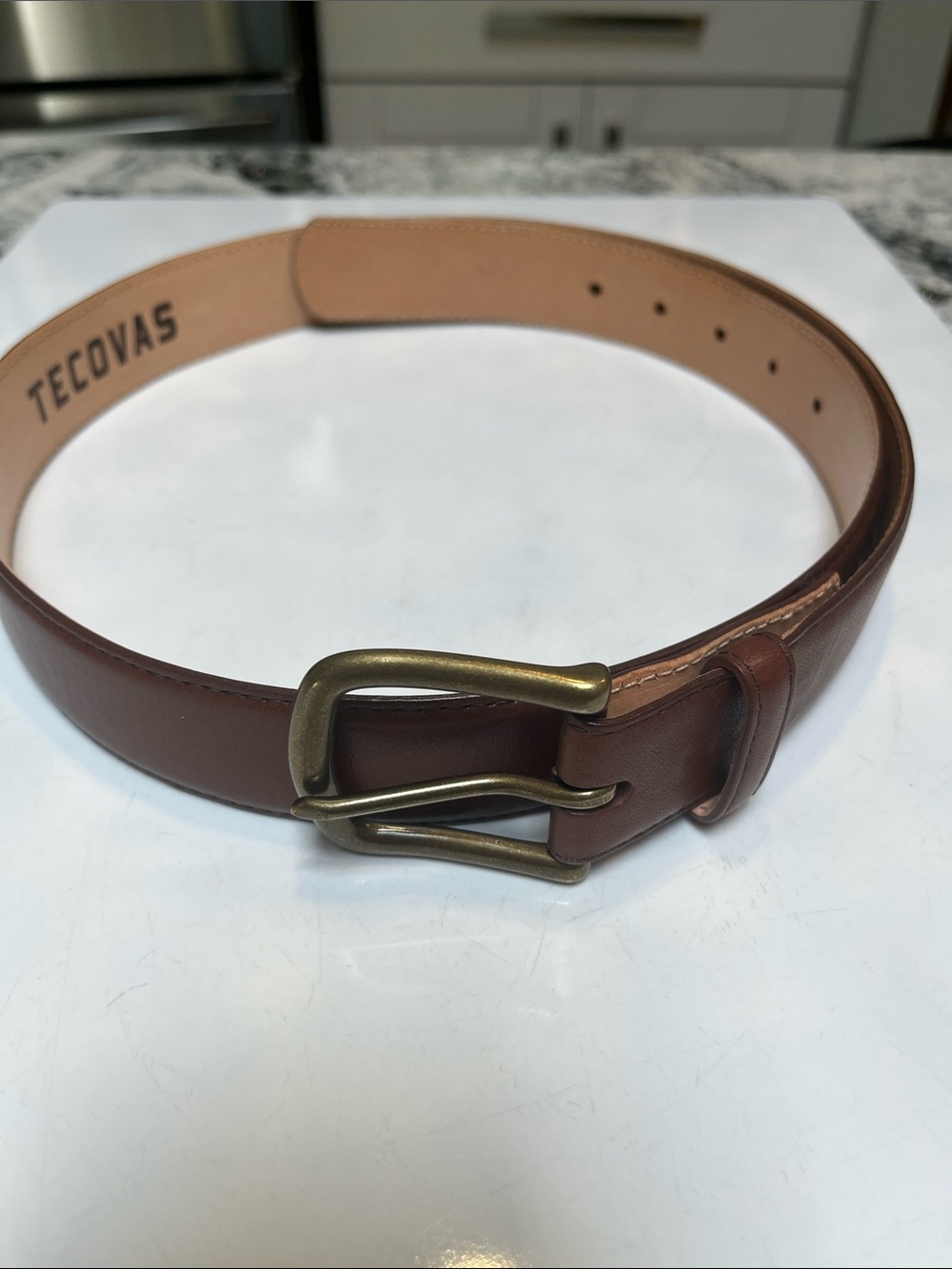 Tecovas men’s Brown Calfskin Belt with Antique Brass Buckle.
